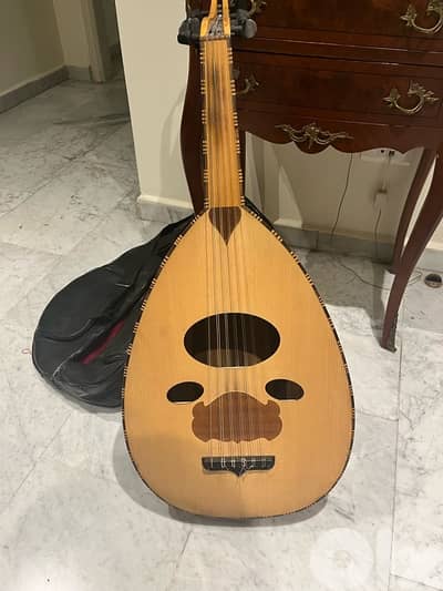 Oud with leather cover