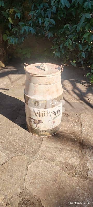 Antique milk bucket