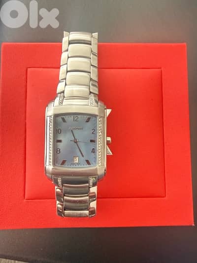 watch with diamond by zoughain nd Sons