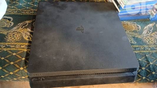 Ps4 slim 500gb 3 controller and 8 games and stand and camera