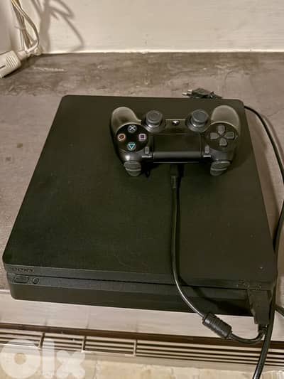 PS4 with 1 controller and 5 games