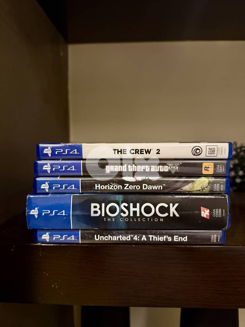 PS4 with 1 controller and 5 games 1