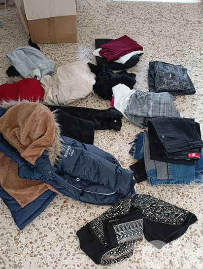 ثياب نسائي و ولادي مستعملة و جديدة فوق ال١٠٠ قطعة