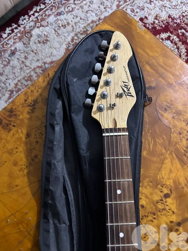 Light blue electric guitar with amp,cable,strap,and picks full bundle 4