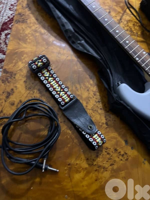 Light blue electric guitar with amp,cable,strap,and picks full bundle 5