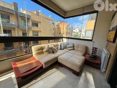 Leather Couch with Wooden Side Tables