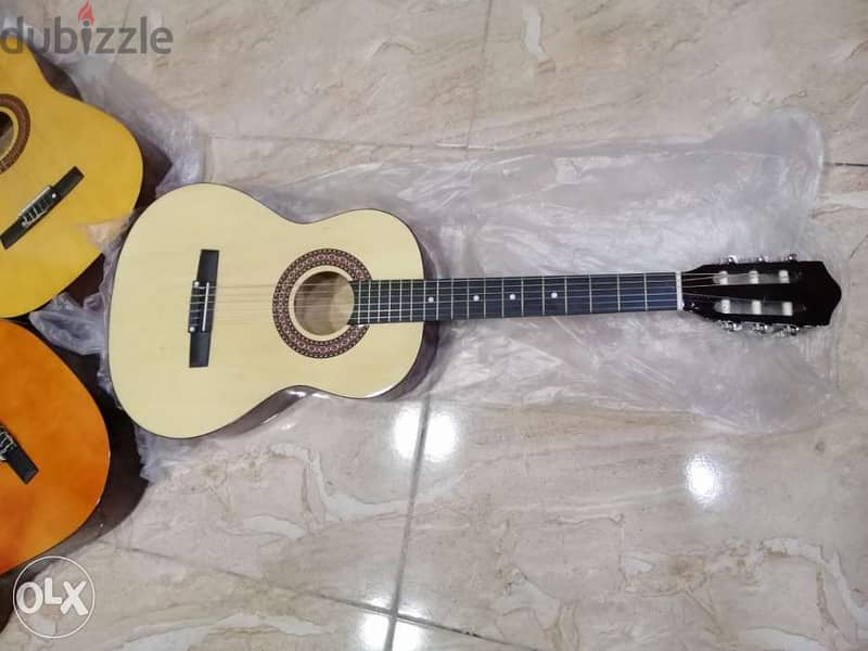 عروضاتنا ما بتنتهي غيتار كلاسيك ٣/٤ 1