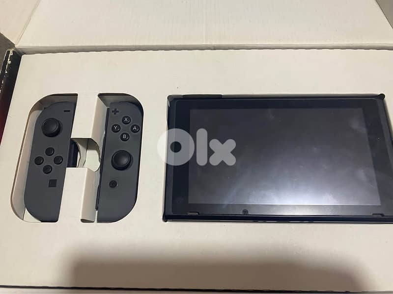 Nintendo switch 1 like new 1