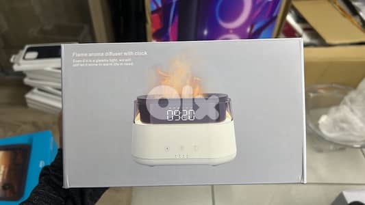 Flame aroma diffuser with clock