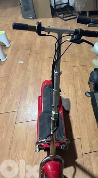 red used electric scooter