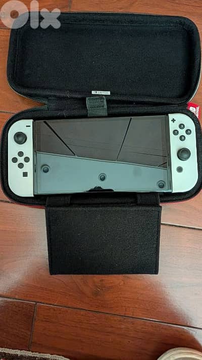 Nintendo Switch OLED perfect condition w 8 games