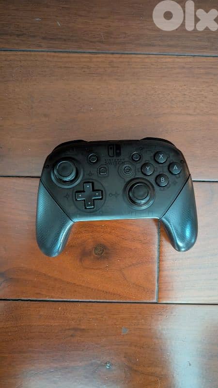 Nintendo Switch OLED perfect condition w original packaging + 8 games 3