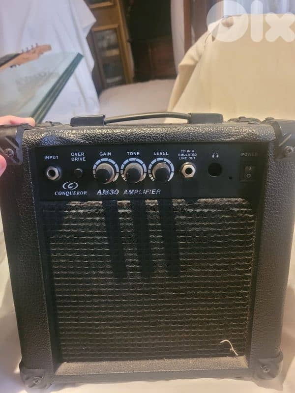 Electric guitar + amp 1