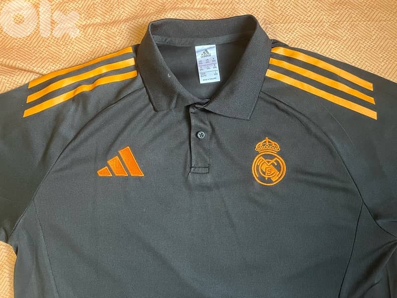 Real Madrid black and orange polo 2