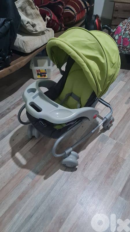 baby love stroller/rocker 1