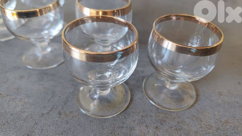 vintage gold-rimmed stemmed glasses 1