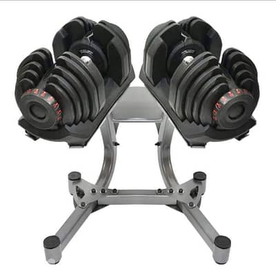 Bowflex dumbells with stand