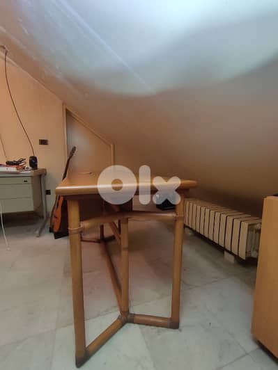 wooden desk with three drawers plus chair