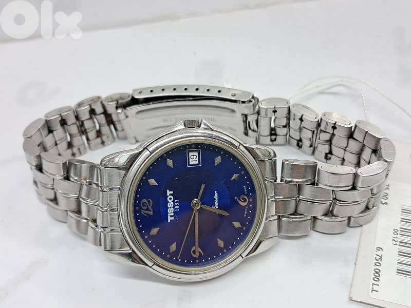 TISSOT  swiss 03032462 2