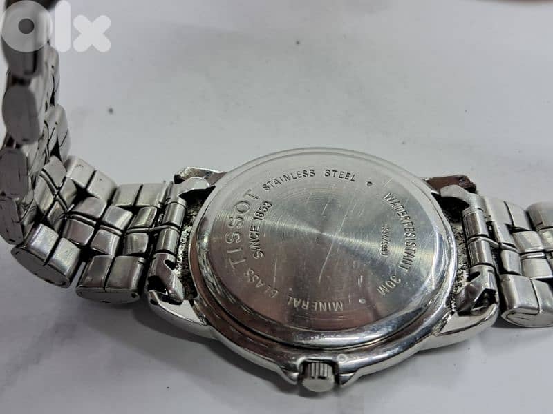 TISSOT  swiss 03032462 4