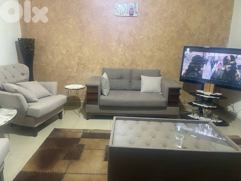 living room +  2 table tv 1