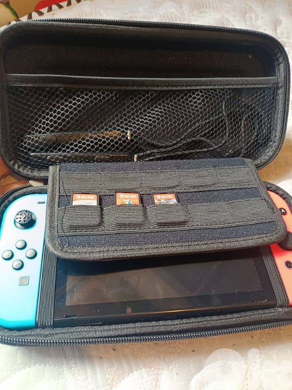 Nintendo Switch original Bundle + 3 Games + Accessories (64GB SD 13