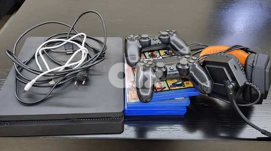 playstation with 2 controllers,headsetgaming,cd(games)and cables