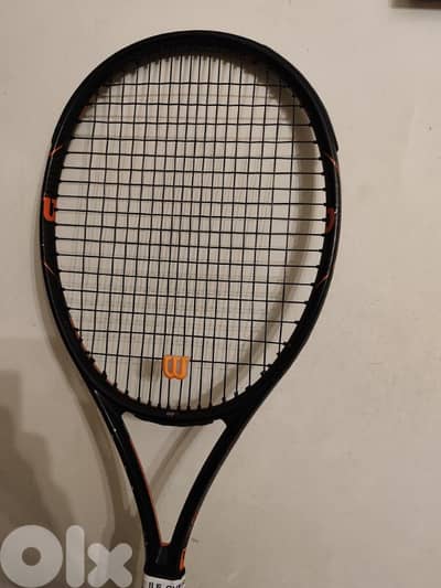 Wilson Burn FST 99S tennis racket.