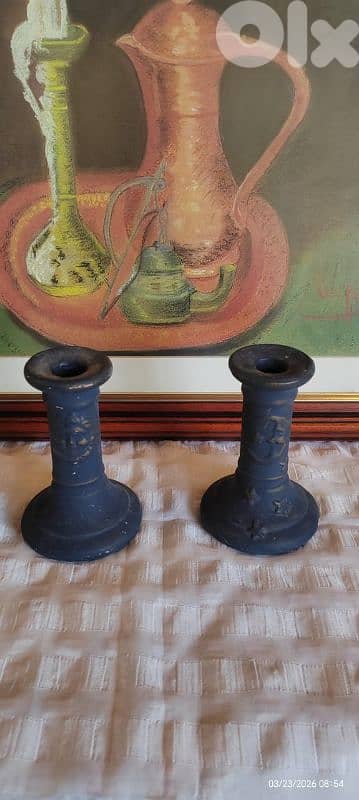 pair of vintage decorative candlesticks featuring celestial themes l