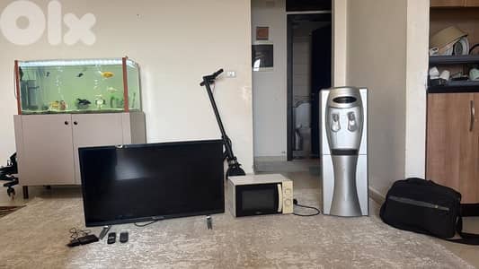 microwave , tv and water cooler