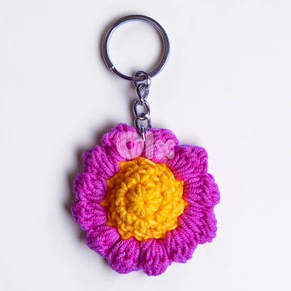 Handmade crochet daisy flower keychain in white blue pink and orange 3
