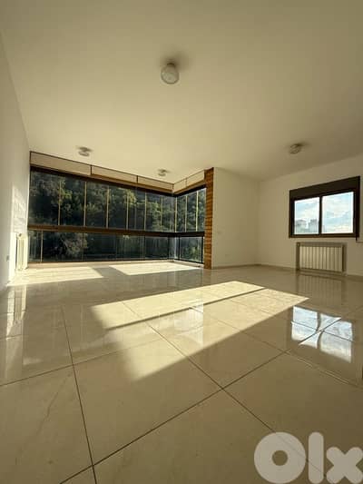 Brand new luminous apartment for sale in Dbaye with greenery views.