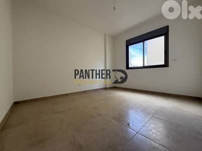 Apartment for sale in Naccache Ref#CA113 شقة للبيع في النقاش