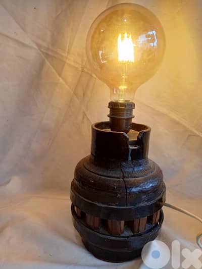 لمبادير مميز مصنوع من دولاب عربة خيل قديمة