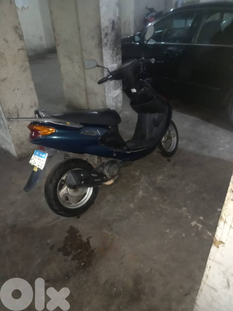 Yamaha grand axis 100 cc 1