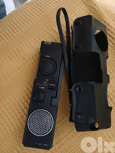 Vintage mini radio with leather box from Aiwa  راديو قديم مع بيت جلد
