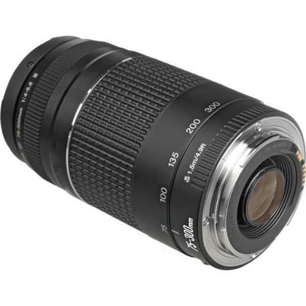 canon Eos 1300d with the lens + another lens canon 75-300mm 2