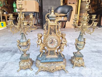 ساعة مع شمعدان عدد٢ برونز انتيك مع رخام مميز