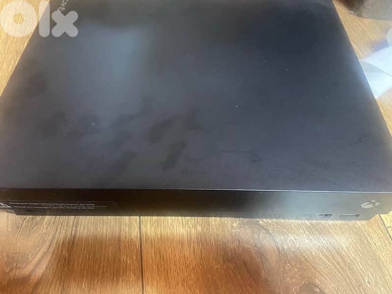 xbox one x used good condition + controller + fifa 23 1