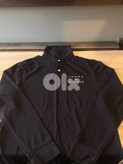 Tommy Hilfiger long-sleeve logo polo shirt.
