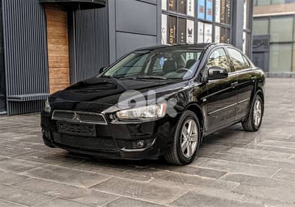 Mitsubishi Lancer EX 2008 2.0 L / Company source 136,000 KM