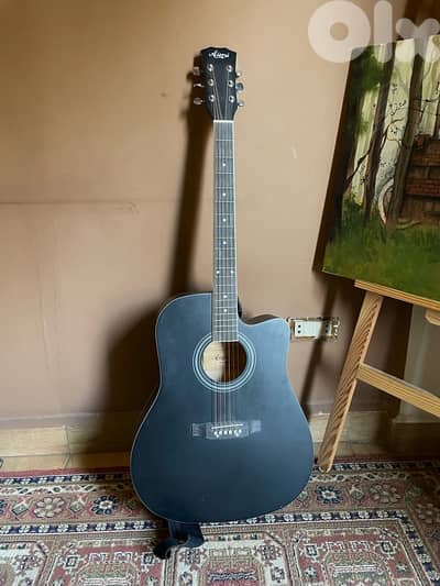 black acoustic guitar