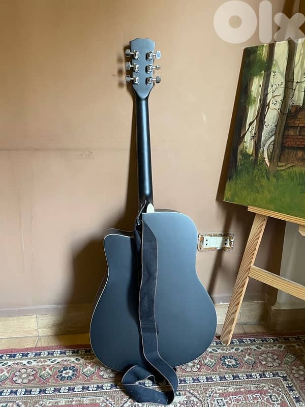 black acoustic guitar 1