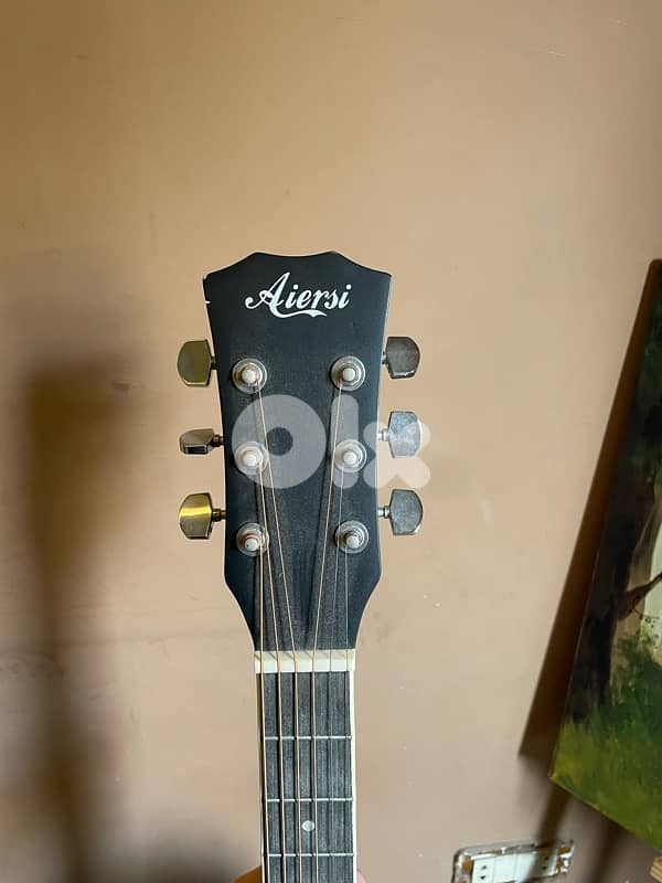 black acoustic guitar 2