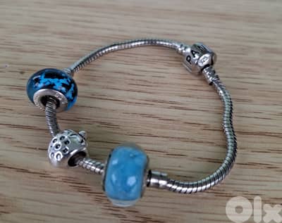 Genuine silver Pandora bracelet with 3 charms