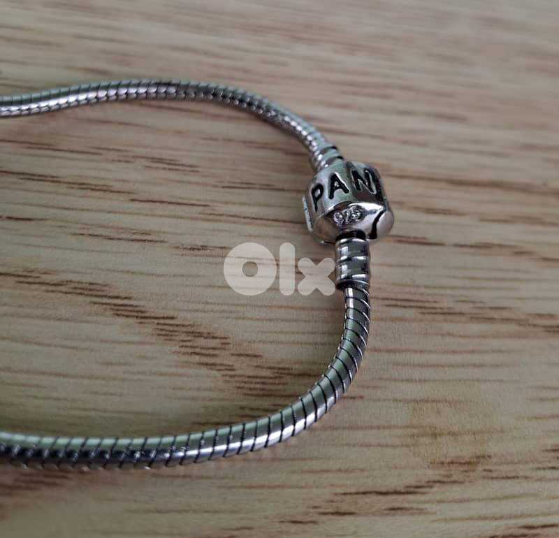 Genuine silver Pandora bracelet with 3 charms 1
