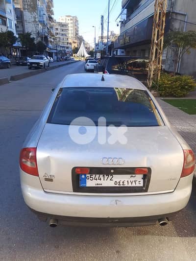 أودي أي 6 أول رود كواترو 2003