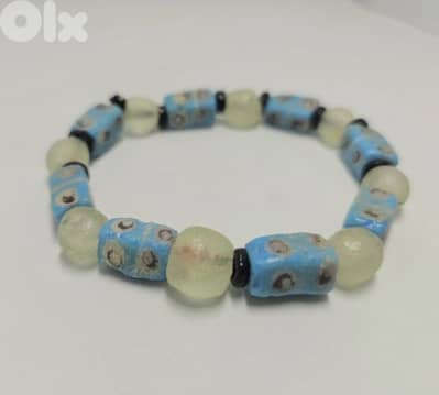 10$ blue african beaded bracelet
