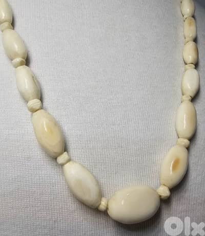 real i. v. o. r. y necklace 38.5 grames 80$