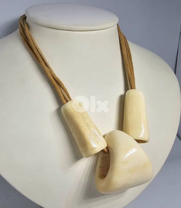 40$ bohemian-style necklace features large bone or horn pendants 2
